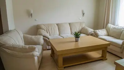 a living room with a couch and a coffee table at Motel Predejane in Predejane