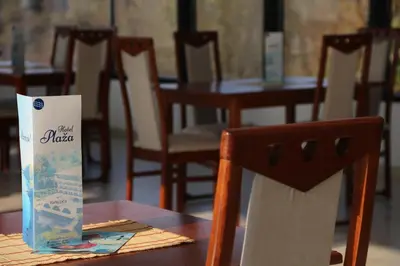 a table with a chair and a box on it at Plaža in Varvarin