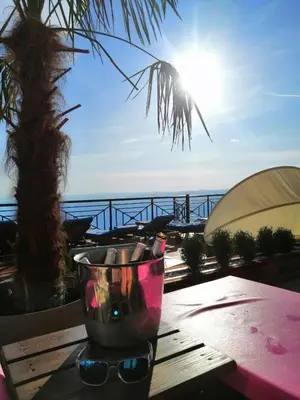 a bowl on a table with a view of the ocean at L18 apartment Milmari in Kopaonik