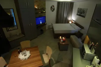 a living room with a couch and a table at Apartman BIG Milmari S19 in Kopaonik