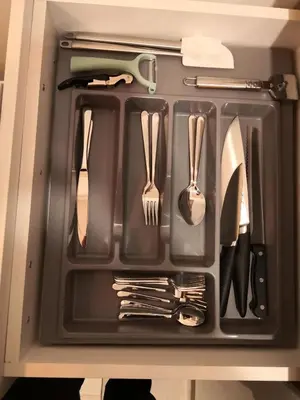 a tray with utensils in a drawer at Lux Suite S5 Milmari Resort in Kopaonik