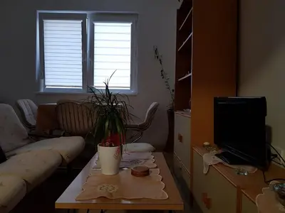 a living room with a couch and a coffee table at Vila I in Niška Banja