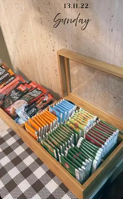 a display case filled with different types of guns at Apartman VR46 in Kopaonik