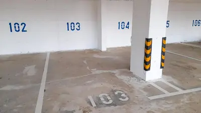 an empty room with numbers on the walls of a building at Panorama Apartman - Milmari L47 in Kopaonik