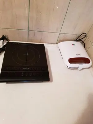 a laptop computer sitting on top of a counter at Apartment Luka-Lena in Kopaonik