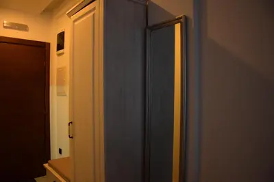 a door to a closet in a room at Apartman Suny N58 in Kopaonik