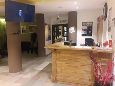 a bar in a restaurant with a counter at Kopaonik Foka Spa Brzeće in Brzeće