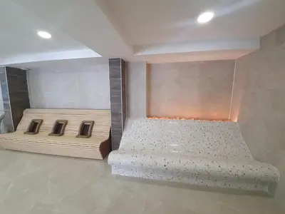 a room with two beds in a room at Apartman Žuta dunja - Sunčani breg in Kopaonik