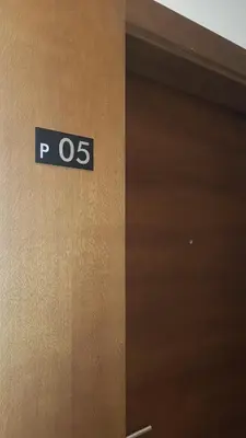 a door with a sign on the side of it at Andre P05 Milmari in Kopaonik