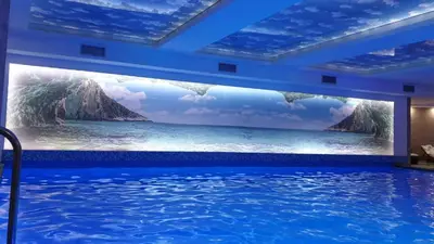 a swimming pool with a painting of the ocean at Milmari resort Sara P61 in Kopaonik