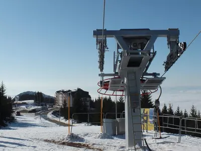 a ski lift on a ski slope in the snow at SUNCANI BREG - STUDIO 11 in Kopaonik