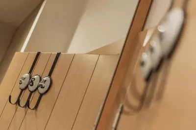 a group of four knobs on a door at Vila Pahulja A3 in Kopaonik
