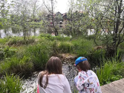 two girls walking down a path near a river at Sky Cabin Apartments - FREE GARAGE in Kopaonik