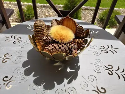 a bowl of pine cones on a table at Sky Cabin Apartments - FREE GARAGE in Kopaonik