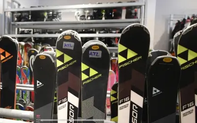 a bunch of snowboards are lined up in a store at IN Apartman, Župa Kopaonik in Kopaonik