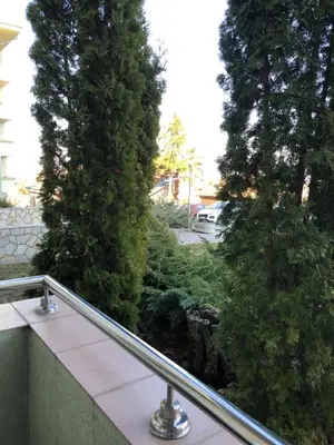 a view of a garden from a balcony at Studio Mišel 2 in Vrnjačka Banja