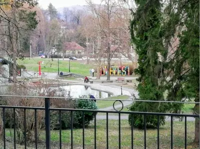 a view of a park with a playground at Apartman Temida Lux in Vrnjačka Banja