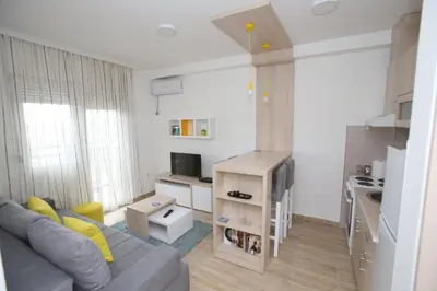 a small living room with a couch and a tv at Fast Sleep & Go 3 in Paraćin