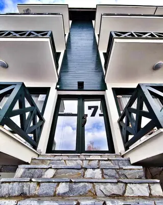 a house with a window with the number seventy on it at Silver Hill apartment in Kopaonik