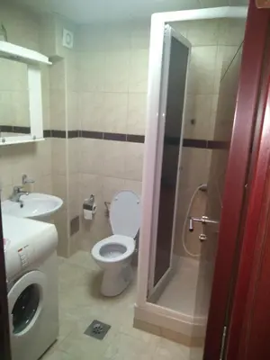 a bathroom with a toilet and a sink at Apartman Jacka in Vrnjačka Banja