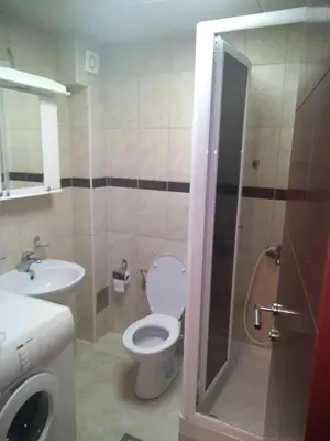 a bathroom with a toilet and a sink at Apartman Jacka in Vrnjačka Banja