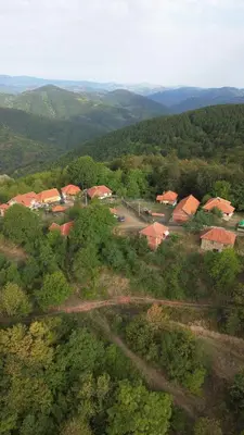 an aerial view of a village with houses and trees at Etno selo Milanovic - Nonac in Kuršumlija