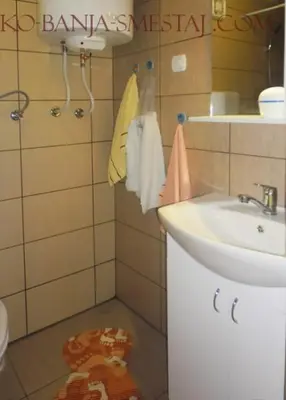 a bathroom with a sink and a sink at Apartman i Studio Stefan Nemanja Sokobanja in Soko Banja