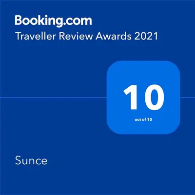 a screenshot of a cell phone with a travel review awaits surprises at Sunce in Kruševac