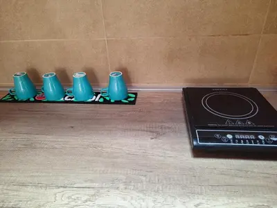 a group of blue candles on a tray on a table at Banjica 2 in Soko Banja