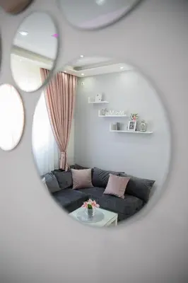 a living room with a couch and a table at DIS apartman 1 in Kruševac