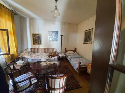 a living room with a couch and a table at Garičkina kuća in Pirot