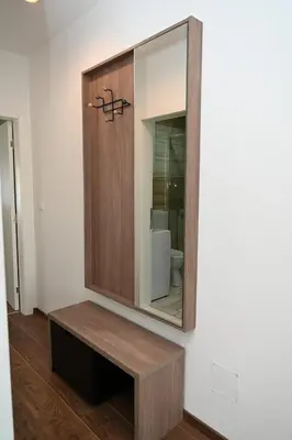 a bathroom with a medicine cabinet on a wall at Sneznik Palace in Vrnjačka Banja