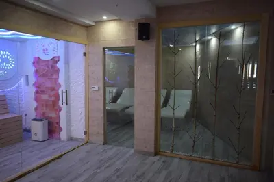 a room with a sliding glass door with a visualization of a living room at Vistanova Milmari S33 in Kopaonik