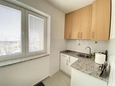 a kitchen with a sink and a window at Apartment 13 in Vrnjačka Banja