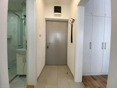 a bathroom with a shower and a toilet and a sink at Apartment 13 in Vrnjačka Banja