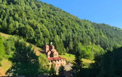 a house on a hill in the middle of a mountain at Apartman u Brzecu - Kopaonik in Kopaonik