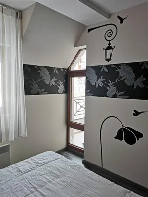 a bedroom with a bed and a window at Milmari Friends and Family in Kopaonik