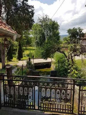 a view of a garden from a fence at Studio Ivana 2 in Soko Banja