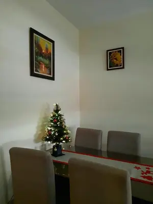 a conference room with a christmas tree on a table at Apartman Ana in Vrnjačka Banja