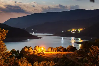 a view of a lake at night at Vila Nemir Zavojsko jezero in Pirot