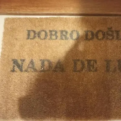 a brown box with the wordsdoroco dog national die at Apartman Nada de lux in Vrnjačka Banja