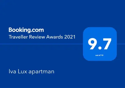 a screenshot of a phone with the travel review awards at Iva Lux apartman in Zaječar