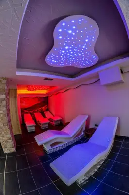 a room with a bunch of beds in it at Milmari Resort M16 Markovic in Kopaonik