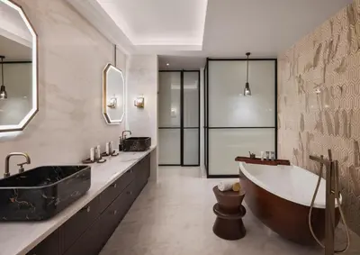 a bathroom with a large tub and a large sink at Viceroy Kopaonik Resort & Spa in Kopaonik