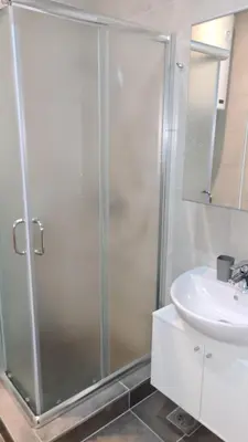 a bathroom with a shower and a sink at Apartman No1,Župa Wellness & Spa Kopaonik in Kopaonik