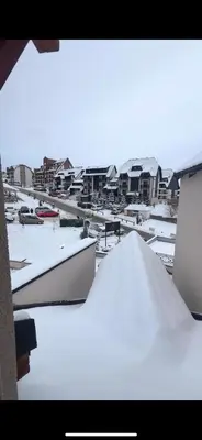 a group of boats are covered in snow at Kopaonik Apartmani Milmari - Katic in Kopaonik