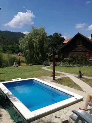 a swimming pool in the yard of a house at Brvnara Aleksic in Kraljevo