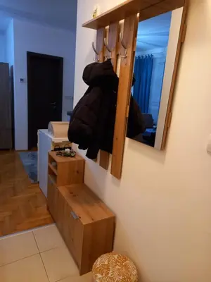 a bathroom with a mirror on the wall at Apartman Dream,Kraljevi Čardaci, sa besplatnim parkingom u garazi in Kopaonik