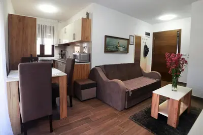 a living room with a couch and a kitchen at 