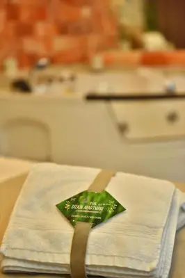 a green star sitting on top of a table at Design Apartment PREMIUM SPA LUX 4 STAR 